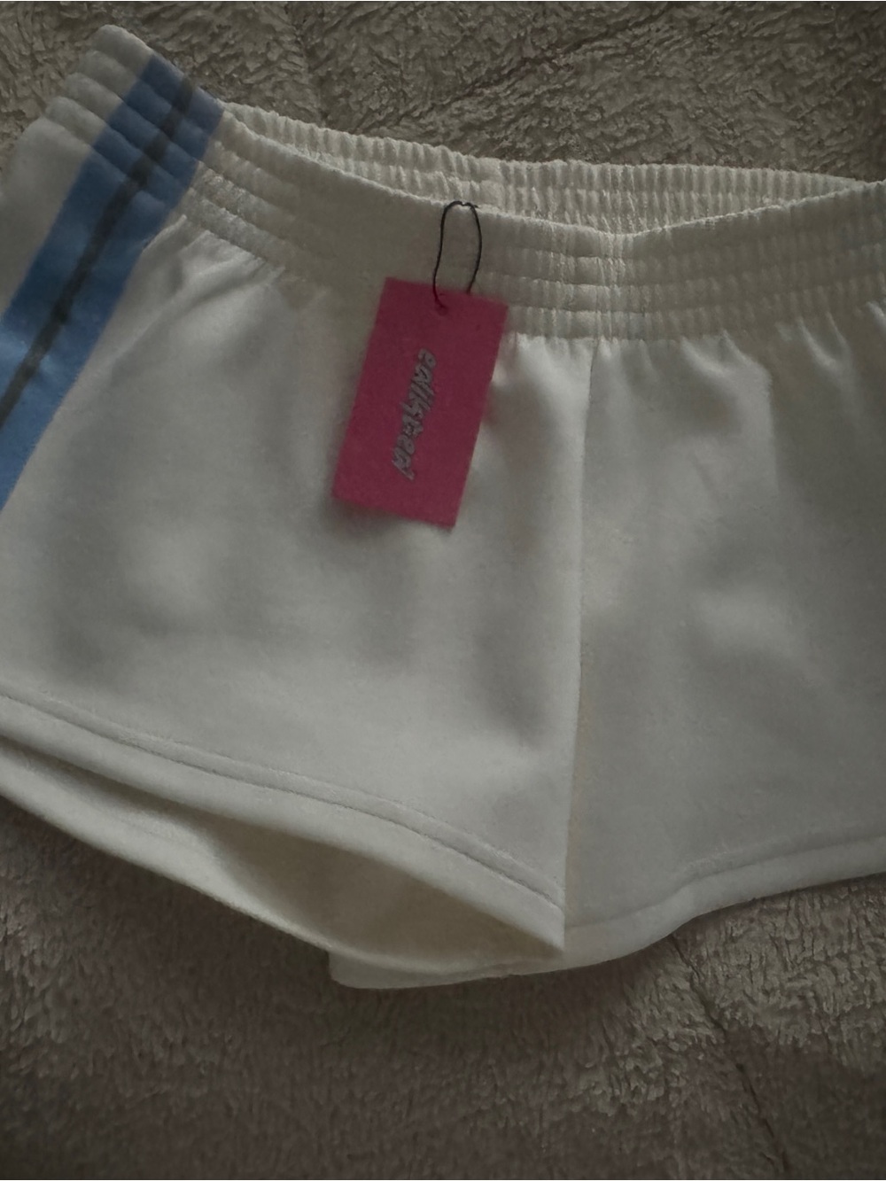 Edikted Cream Athletic Shorts with Light Blue Side Stripes